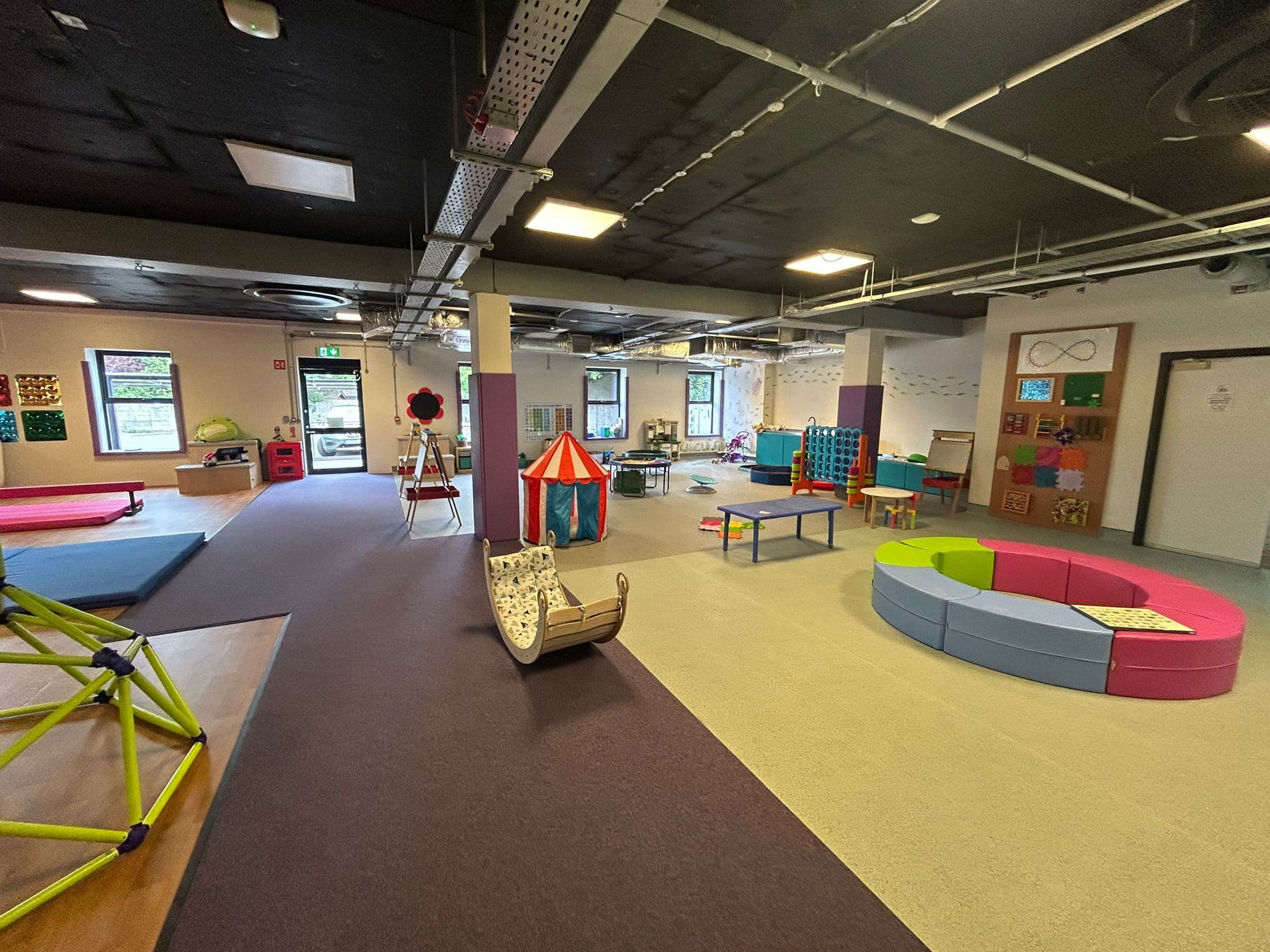 Our large hall with movement equipment and creative play stations