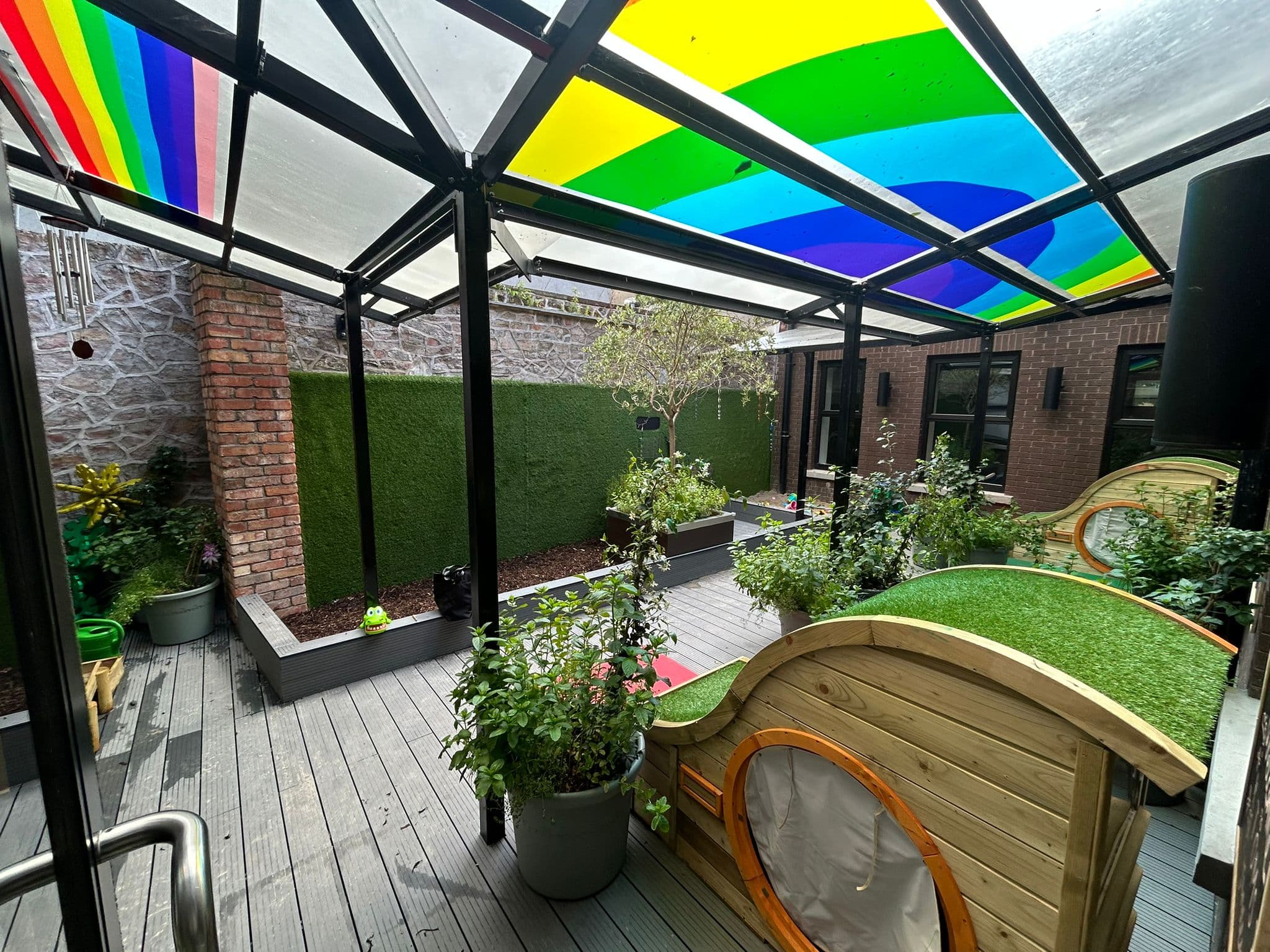 The NDI garden - rainbow canopy, sensory planting and the hobbit nook